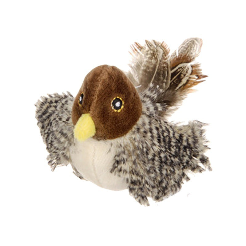 Oiseau en peluche marron et beige avec plumes douces et bec jaune.